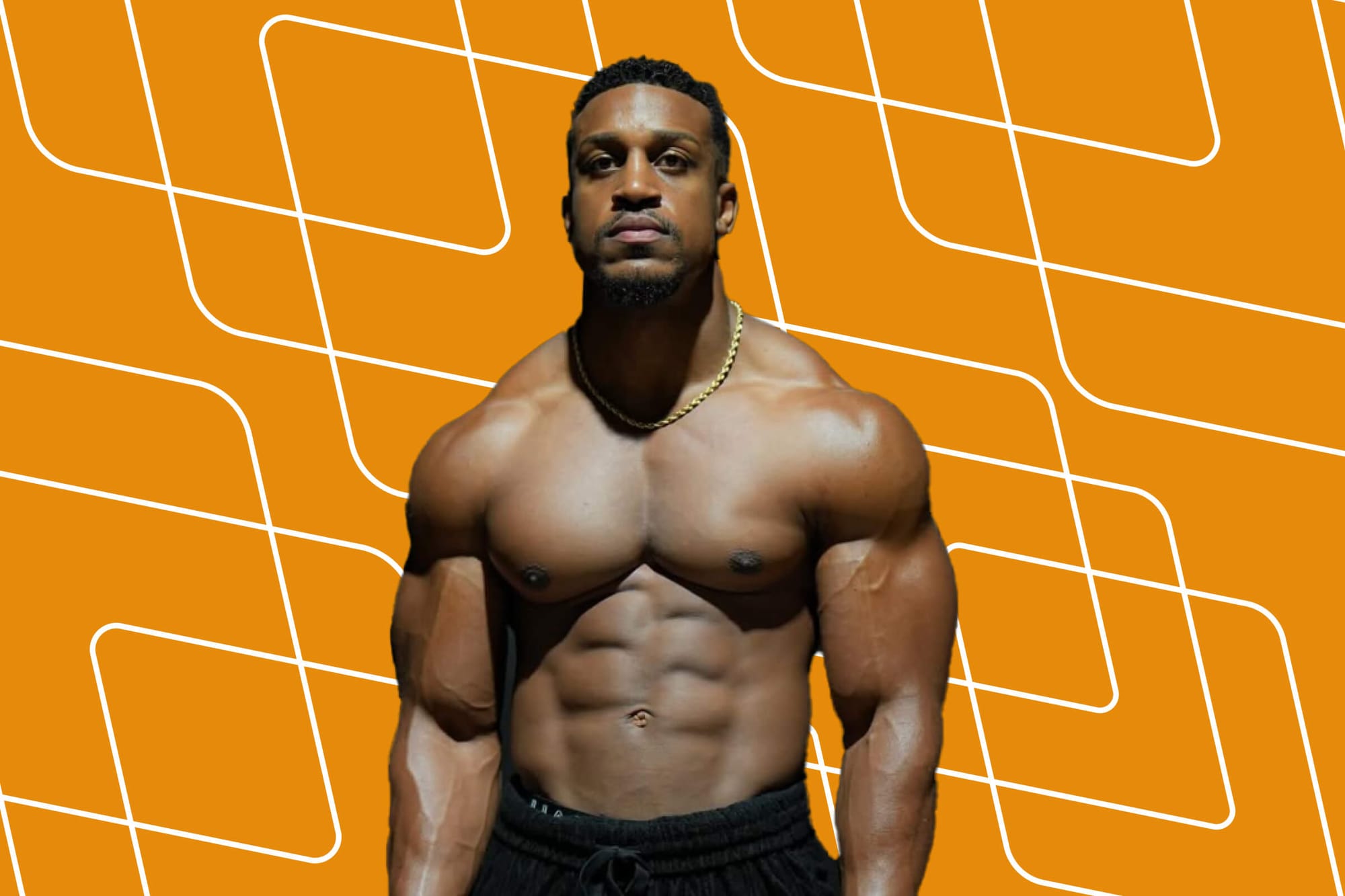 Ashton Hall posing shirtless against an orange background with white geometric lines.