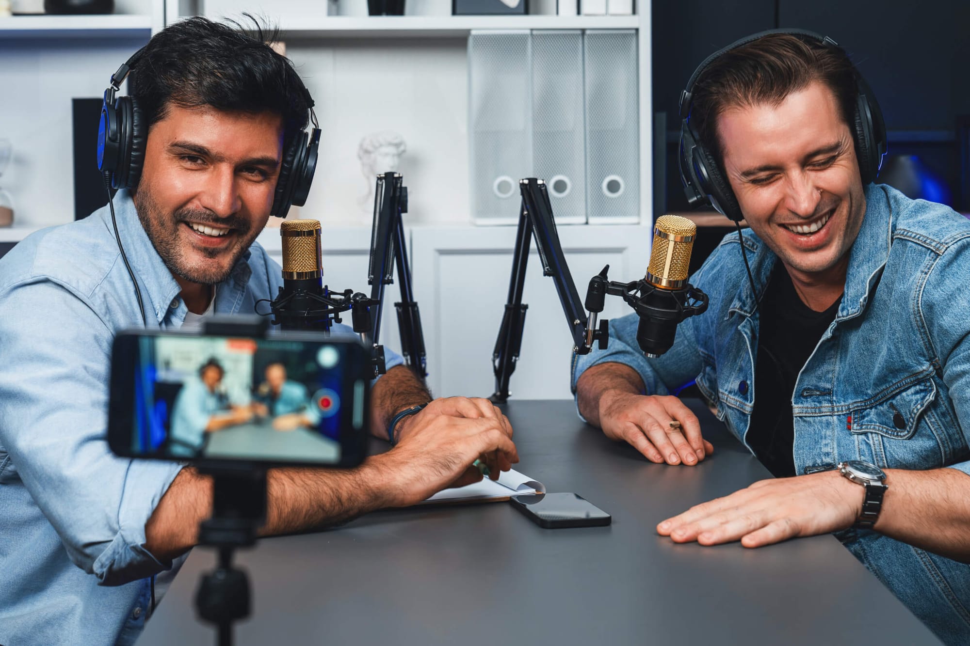 Two men recording a podcast